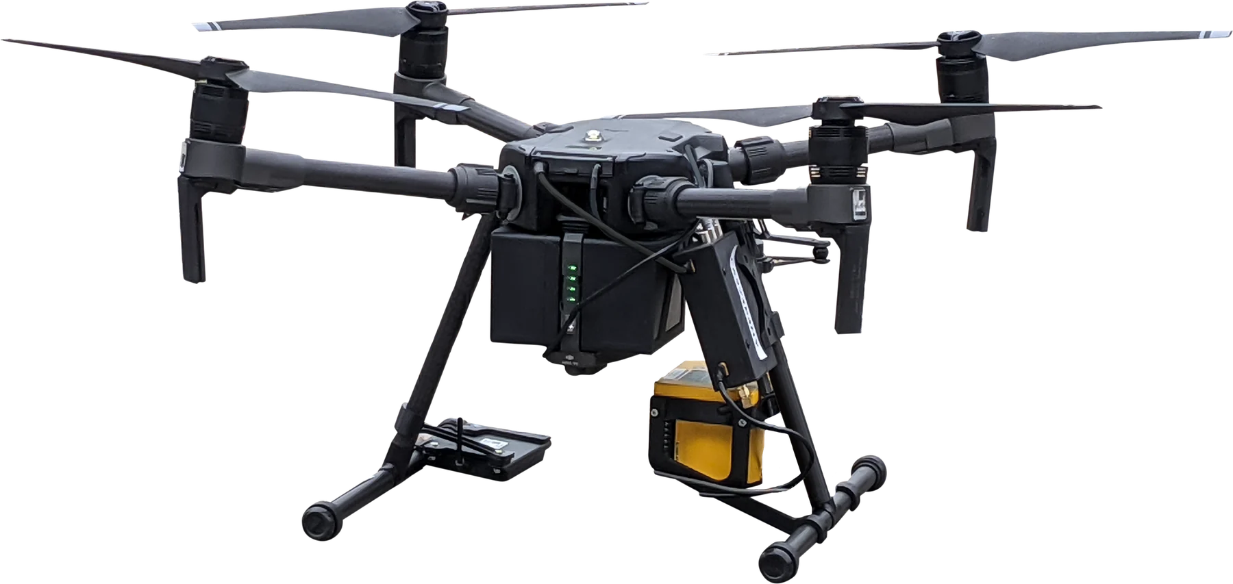 LASER FALCON, a yellow sensor, mounted under a DJI Matrice quadcopter